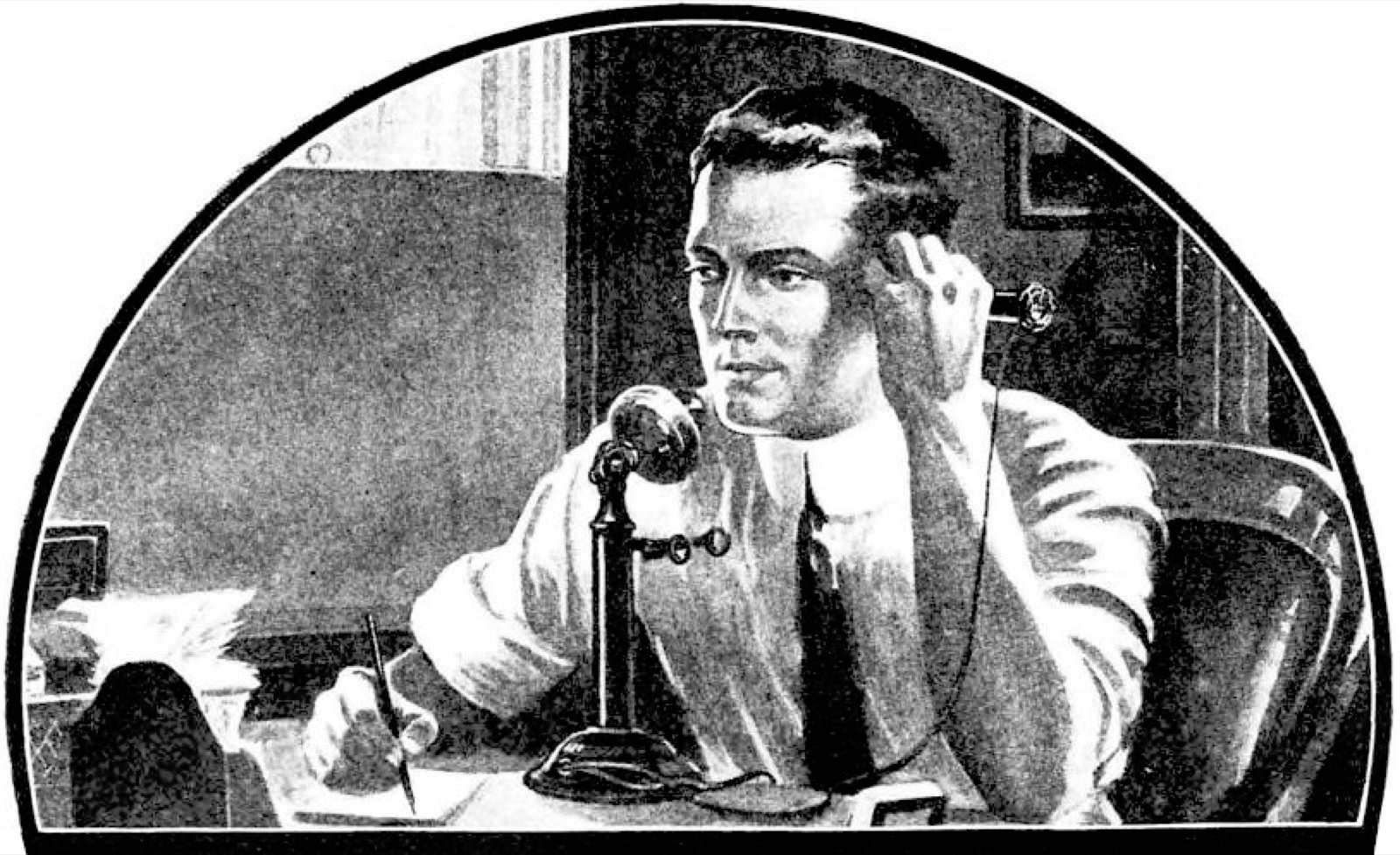 A businessman speaking into a candlestick telephone